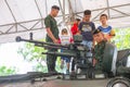 Thailand national children day 2018 activity - family and children enjoy fun with military tanks guns Royalty Free Stock Photo