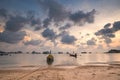 Thailand ocean pier sunrise: boats, ships, water transport at sand shore. Colorful sun rise seascape
