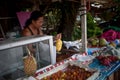 Thailand 2013 October 2, seller fruit cleans pineapple for buyer, Koh Chang Thailand.