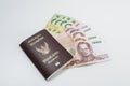 Thailand passport with Thai money ready to travel
