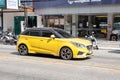 Yellow car model Morris Garage MG3 hatchback body on the street