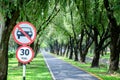 Thailand round traffic sign, the passage of vehicles, No car Entry, speed limited 30 kilometers per hour on the loacal road with Royalty Free Stock Photo