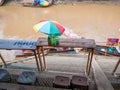 THAILAND, SAMUTSONGKHRAM - JUNE 17,2018 : Traditional thai steet food at Amphawa floating market canal in Thailand.People can buy