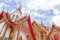 Thailand temple on a cloudy sky with the sun. Royalty Free Stock Photo