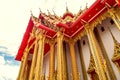 Thailand temple on a cloudy sky with the sun. Royalty Free Stock Photo