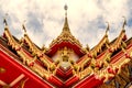 Thailand temple on a cloudy sky with the sun. Royalty Free Stock Photo