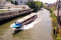 The Thailand tourist canal boat on village river