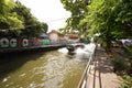 Thailand tourist canal boat on village river at daytime