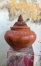 Thailand traditional clay jar used for water drink with grunge background Royalty Free Stock Photo