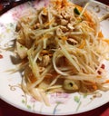 Cold mango salad with peanut mixed in spice and sour juice Royalty Free Stock Photo