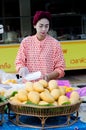 Thailand women selling mangoes