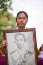 Thailand women,Thai girl were holding pictures of the king of Thailand