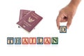 THAILAND write in colorful wood alphabet blocks and hand holding D with Thailand passport isolated on whit Royalty Free Stock Photo