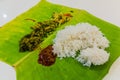 Thali, Indian meal, served on a banana le Royalty Free Stock Photo