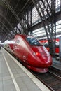 Thalys high-speed train at Cologne KÃÂ¶ln main railway station Hauptbahnhof Hbf portrait format in Germany