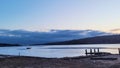 Thames river Connecticut at old ferry crossing site in winter with docked sailboat Royalty Free Stock Photo