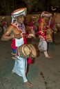 Thammattam Players perform at the Esala Perahara in Kandy, Sri Lanka.