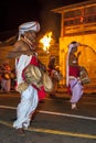 Thammattam Players perform at the Esala Perahera in Kandy, Sri Lanka.