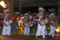 Thammattam Players perform in front of large crowds during the Esala Perahera in Kandy, Sri Lanka. Royalty Free Stock Photo