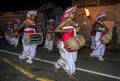 Thammattam Players (right) lead a group of Davul Players as they perform during the Esala Perahera in Kandy, Sri Lanka. Royalty Free Stock Photo