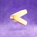 Less than icon. Gold glossy Less than symbol isolated on violet velvet background.