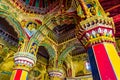Thanjavur, Tamil Nadu, India - The high arches artworks and colorfully painted wall murals durbar hall Maratha Palace Royalty Free Stock Photo