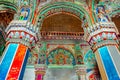 Thanjavur, Tamil Nadu, India - The high arches artworks and colorfully painted wall murals durbar hall Maratha Palace Royalty Free Stock Photo