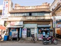 Shops in an old fashioned structure on the market streets of the town of Thanjavur Royalty Free Stock Photo