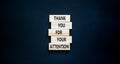 Thank you for attention symbol. Concept words Thank you for your attention on wooden blocks on a beautiful black table black Royalty Free Stock Photo