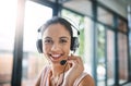 Thank you for calling our company. Cropped portrait of an attractive young woman working in a call center. Royalty Free Stock Photo