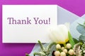 Thank you card in bouquet of roses, tulips, eucalyptus on purple background. White blank card with space for text, frame mockup Royalty Free Stock Photo