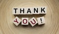 Thank you concept. Wooden blocks on a vintage table with text. copy space Royalty Free Stock Photo