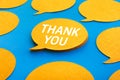 Thank you concepts with chat,speech bubble icons on blue color background Royalty Free Stock Photo