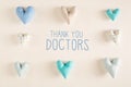 Thank You Doctors message with blue heart cushions