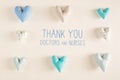 Thank You Doctors and Nurses message with blue heart cushions