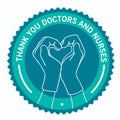 Thank You Doctors and Nurses. Sign Sticker round blue colors. Hands in the shape of a heart. Human hands in medic gloves show a Royalty Free Stock Photo