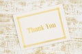 Thank you greeting card on grunge gold
