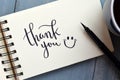 THANK YOU hand-lettered in notepad
