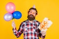 thank you. happy birthday to you. male holiday celebration. bearded guy with party balloons and gift box. unshaven