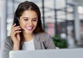 Thank you for holding - how may I assist. a young call centre agent working in an office. Royalty Free Stock Photo