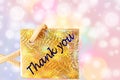 Thank you letter tag or label with de focused circles background Royalty Free Stock Photo