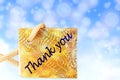 Thank you letter tag or label with de focused circles blue sky background Royalty Free Stock Photo