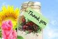 Thank you letter tag or label with flower and mason jar Royalty Free Stock Photo