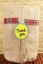 Thank you letter tag or label with jute bag Royalty Free Stock Photo