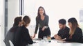 Thank you for making such a great suggestion. a young businesswoman giving a presentation to her colleagues in an office Royalty Free Stock Photo