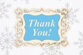 Thank you message in a wood frame with snowflakes