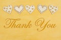 Thank you message with wood hearts on hand painted distressed gold