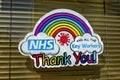 A Thank You NHS & Key Workers Rainbow of Hope Sign on a window
