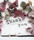 A thank you note and flowers