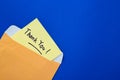 Thank you note on yellow paper in an envelope